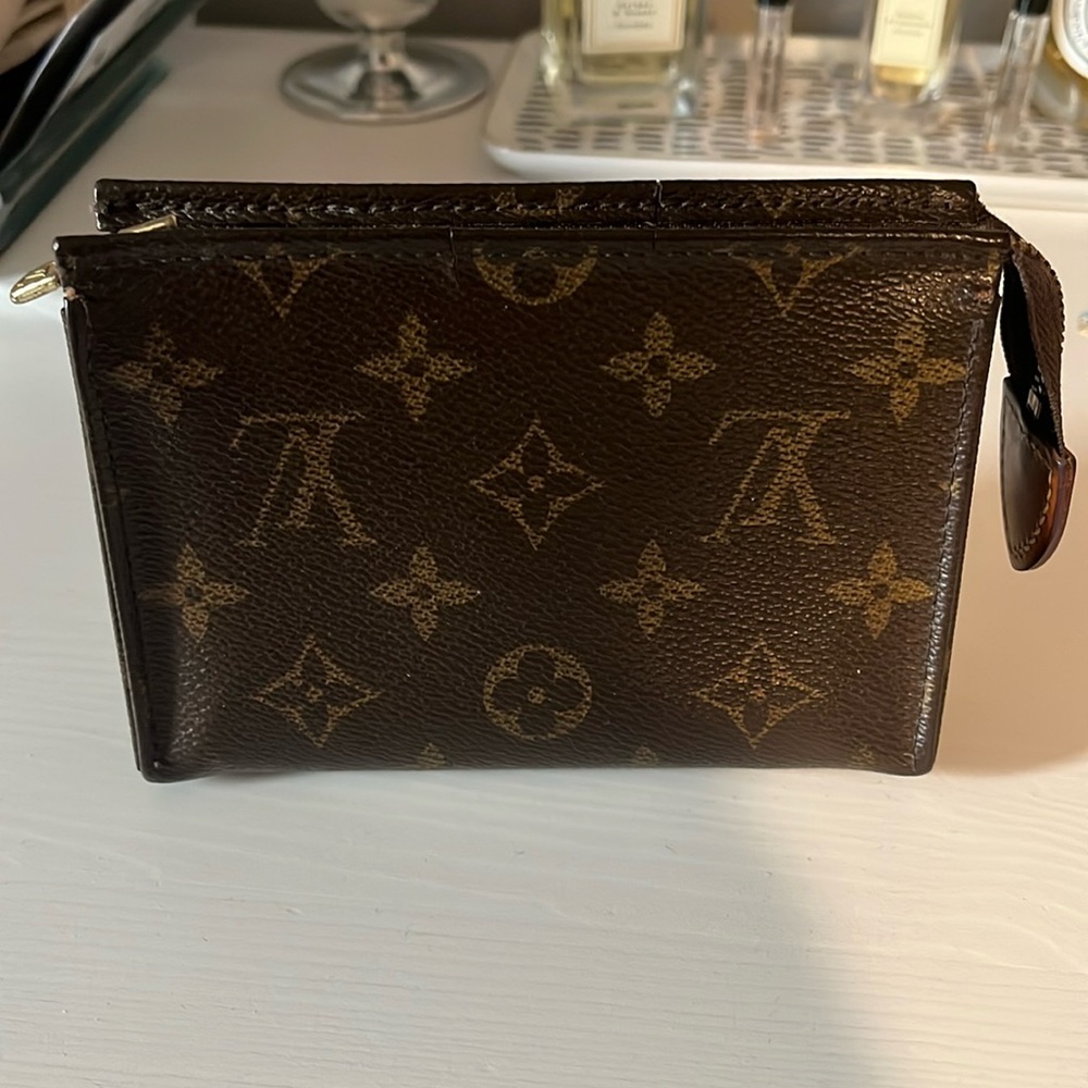 Authentic Louis Vuitton Monogram Poche Toilette
